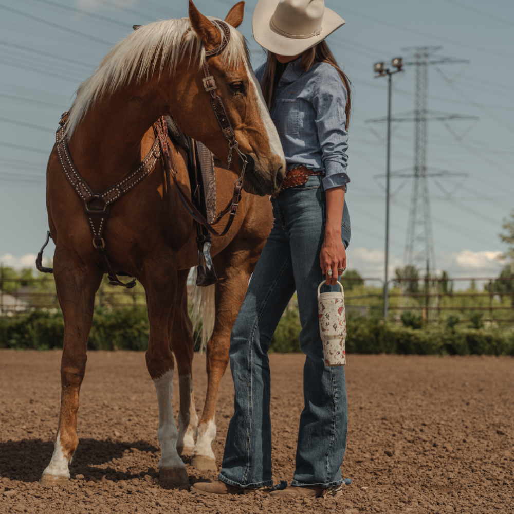 Woman Holding Tradeons Rodeo Sport Bottle 40oz