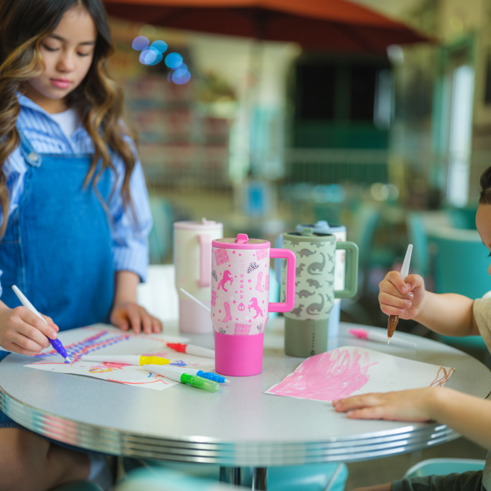 Children Drawing with Tradeons Travelers 20oz on Table