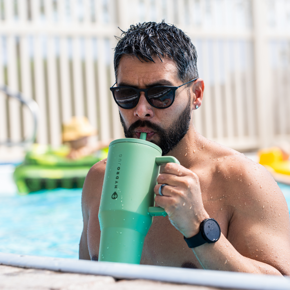 Man Drinking from Tradeons Sage Traveler 40oz