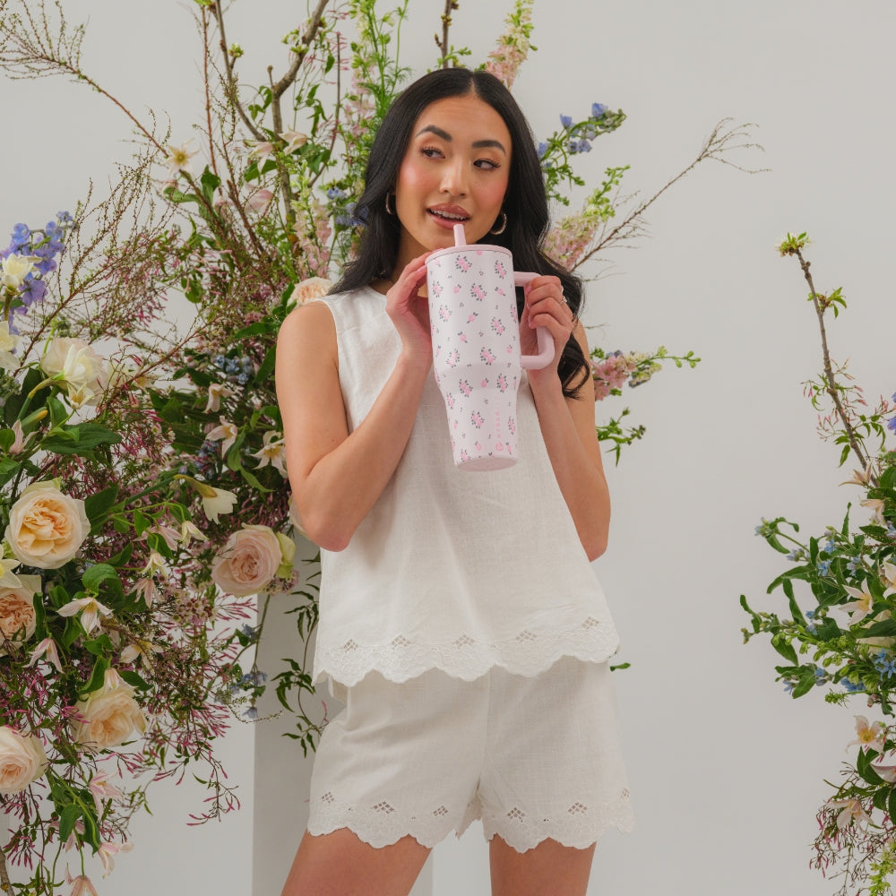 Woman Holding Tradeons Wildrose Traveler 40oz