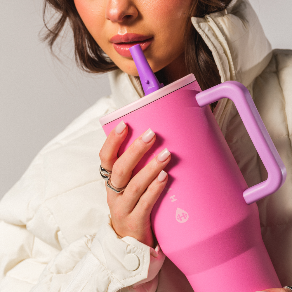 Person Drinking from Tradeons Pink Sugar Traveler 32oz