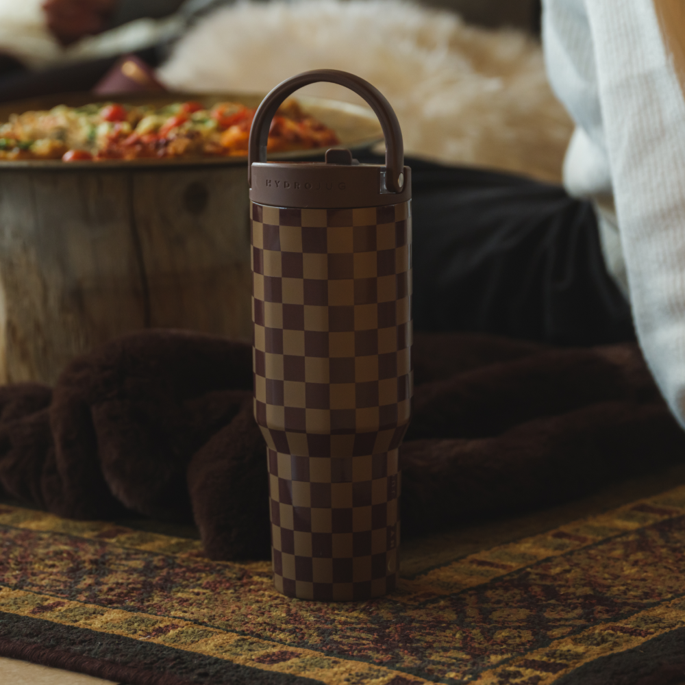 Autumn Checkers Sport Bottle 32oz in Cozy Indoor Setting