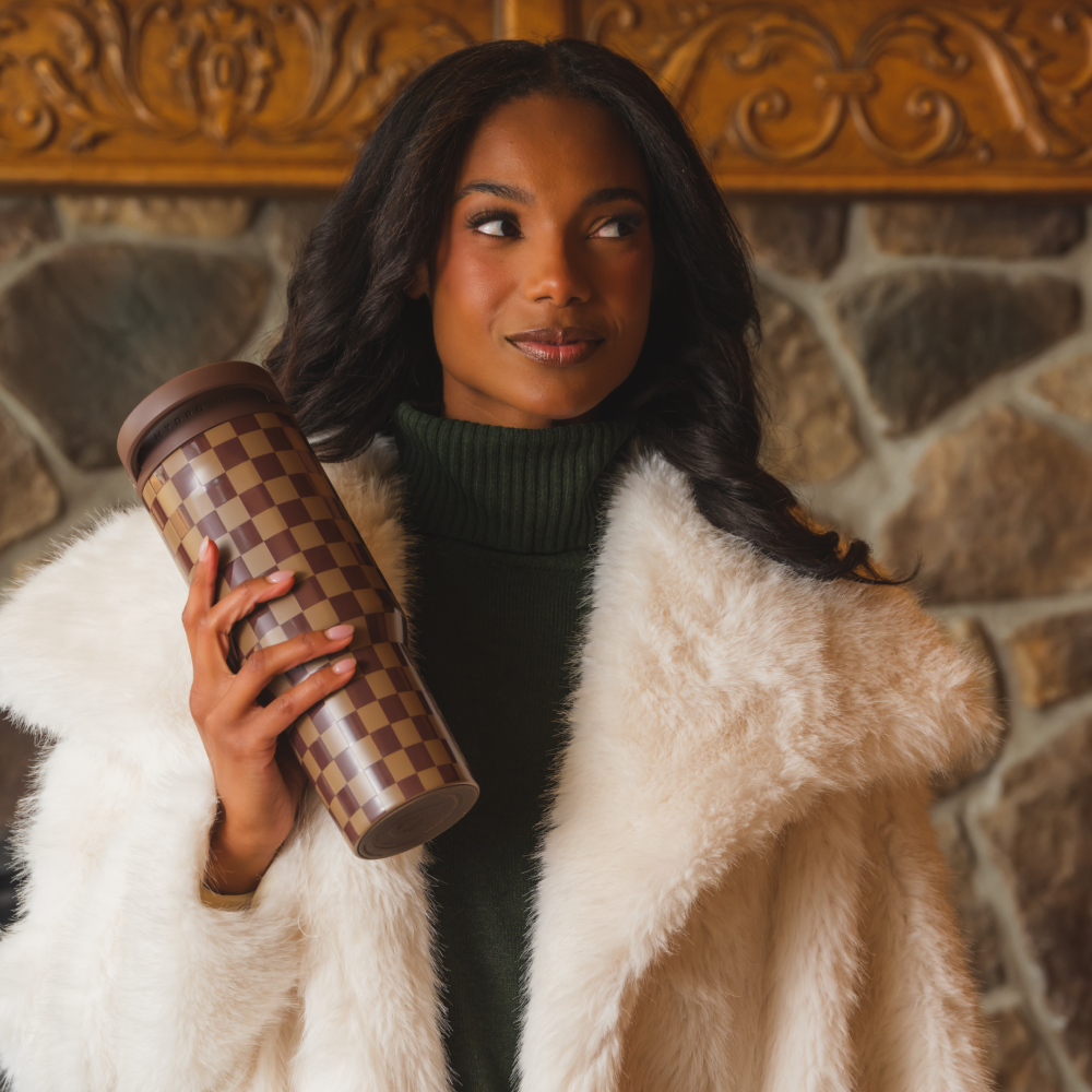 Woman Holding Tradeons Autumn Checkers Sport Bottle 32oz