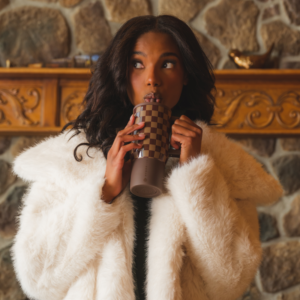 Woman Drinking from Autumn Checkers Traveler 20oz