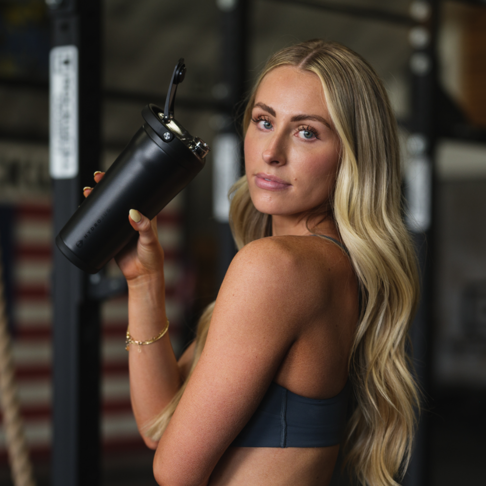 Tradeons Black Insulated Shaker 20oz in Use at Gym